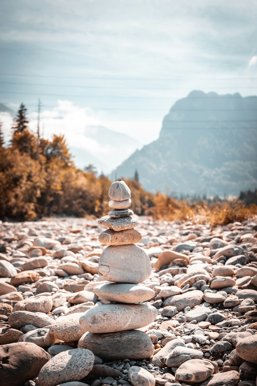 a pile of rocks sitting on top of a gravel road