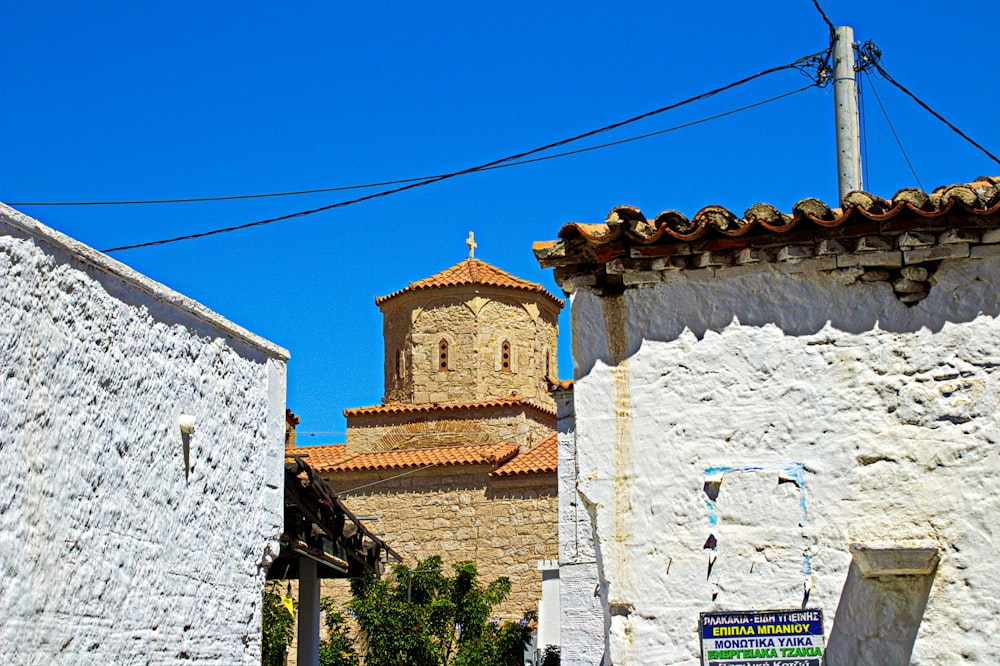 a street with a clock tower in the background