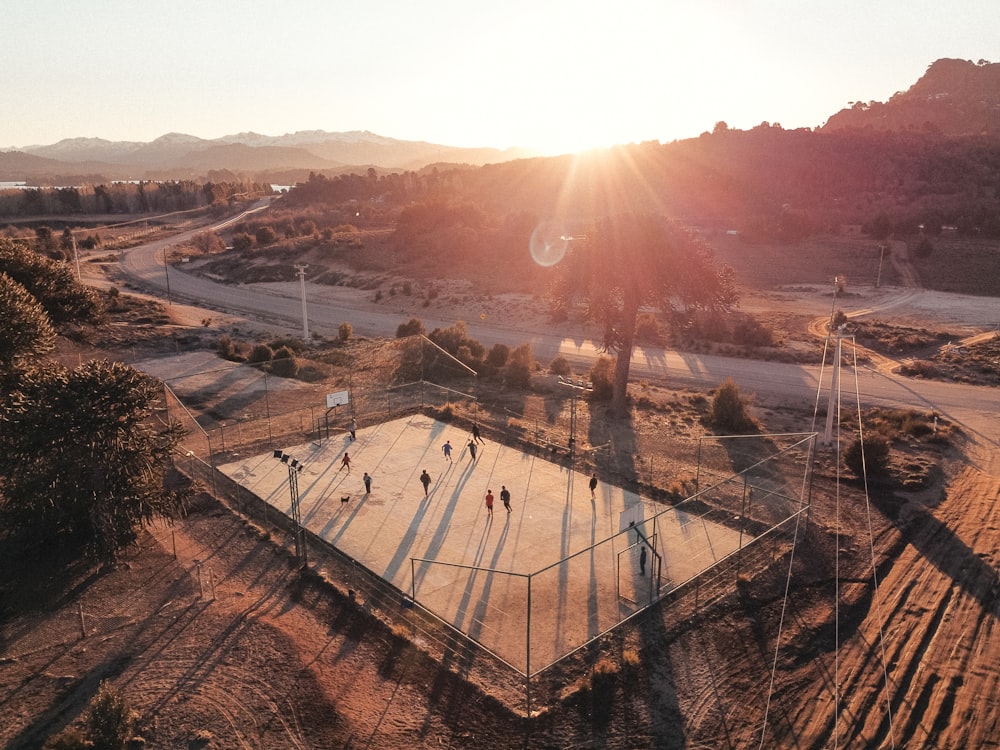 a group of people playing a game of ice hockey