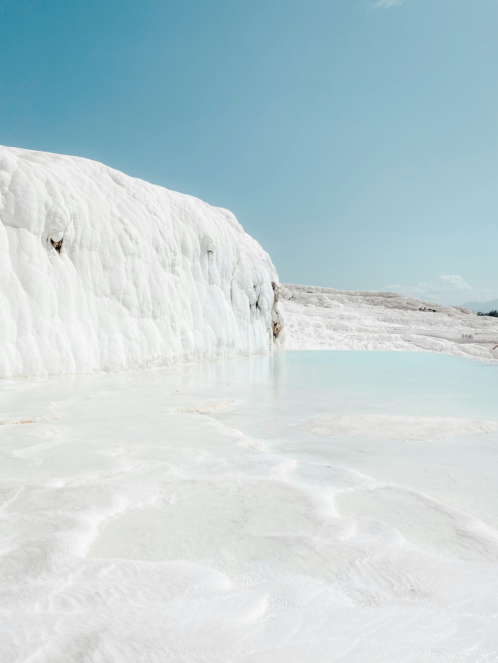 a body of water that is covered in snow