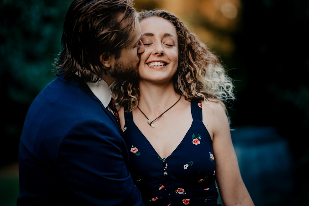 a man and a woman embracing each other