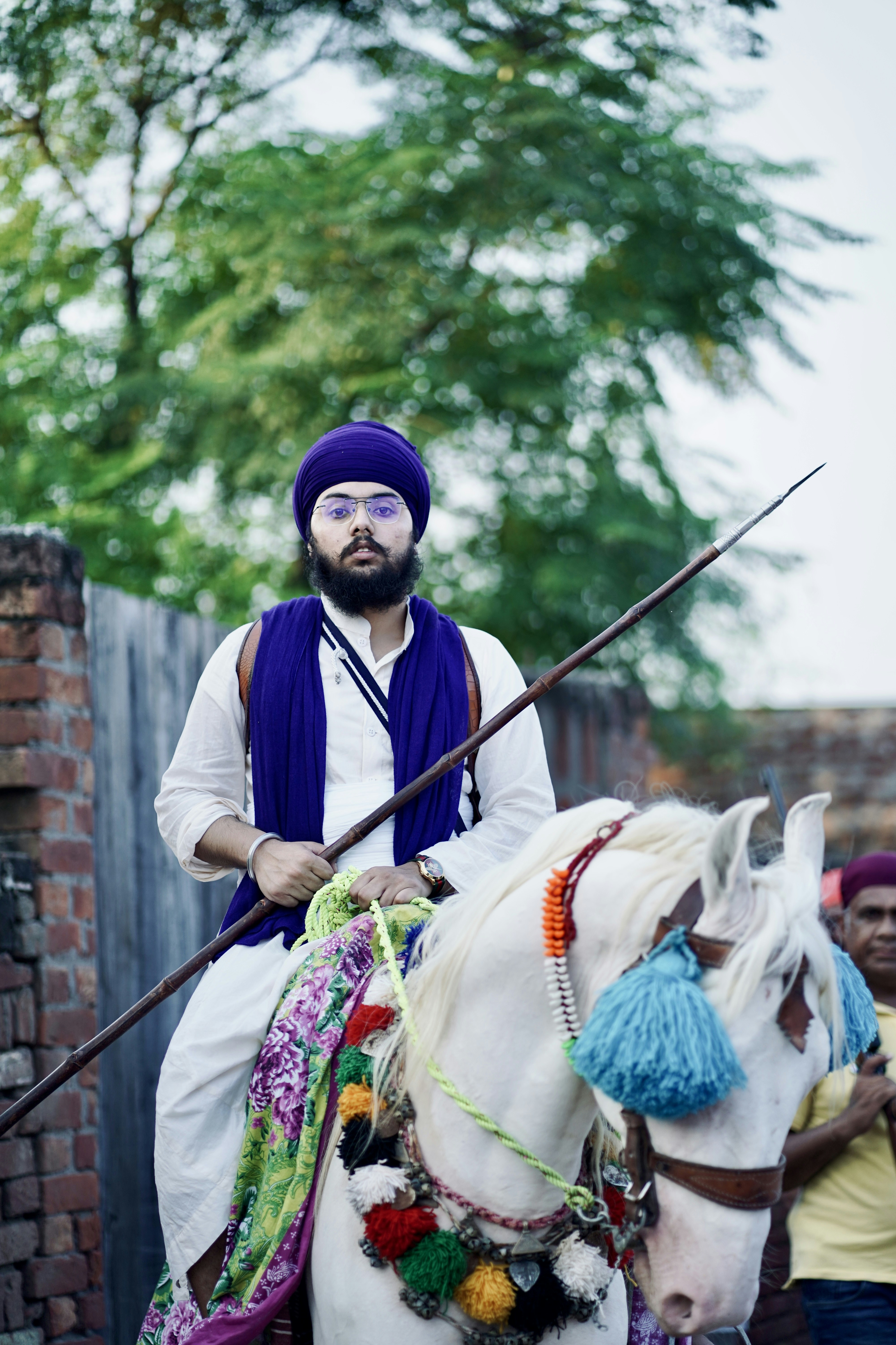 A man riding on the back of a white horse photo – Free Portrait Image ...