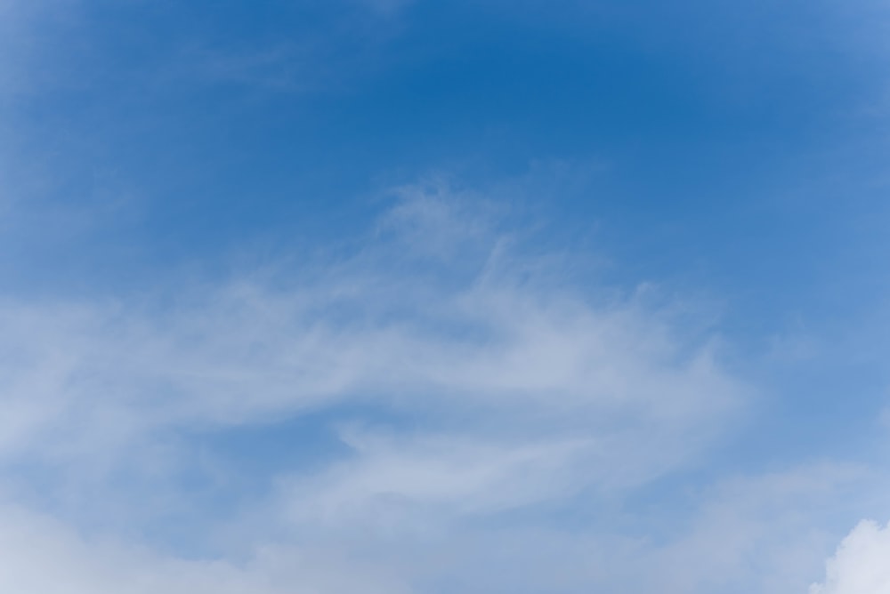 a blue sky with a few clouds in it