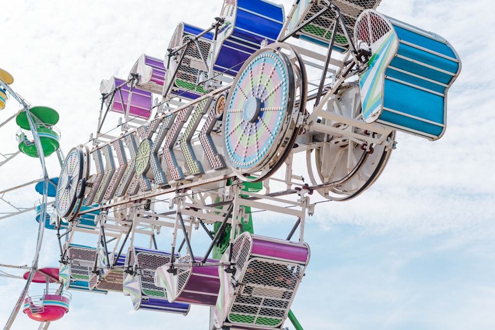 a ferris wheel that has a clock on it