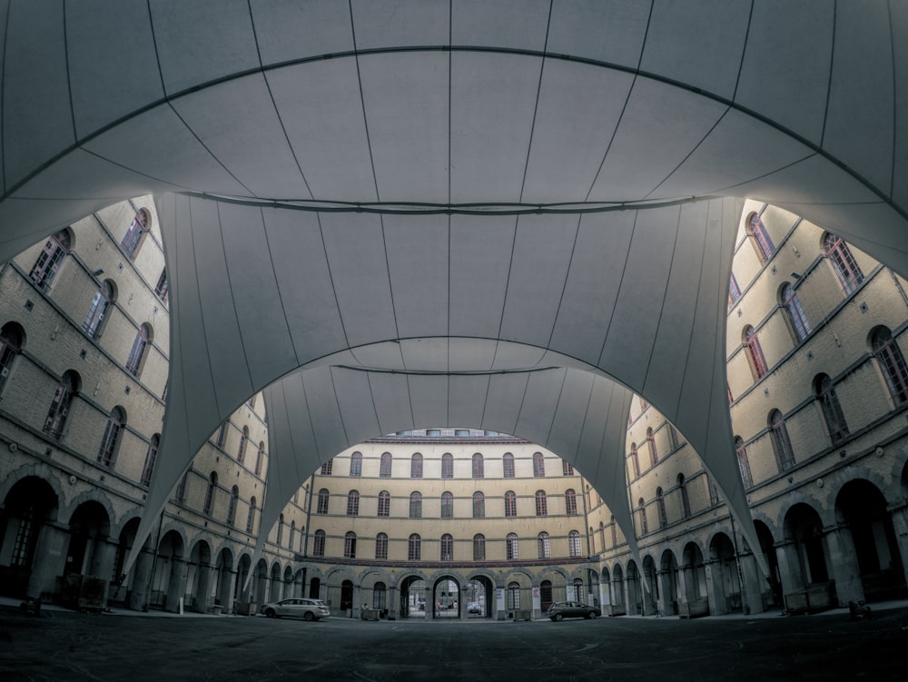 a large building with arches and arches on the ceiling