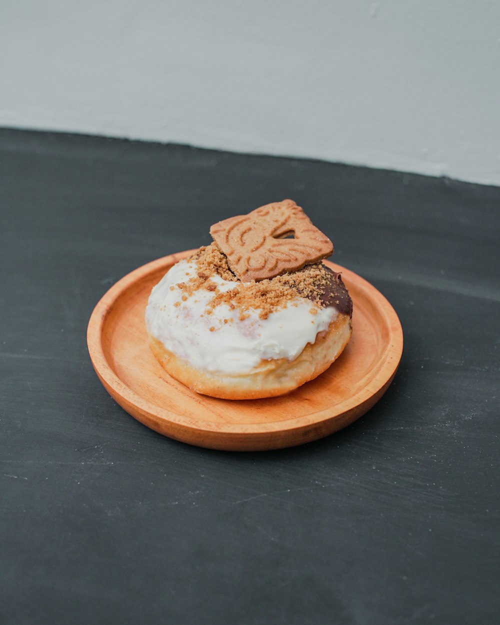 a doughnut with a cookie on top of it