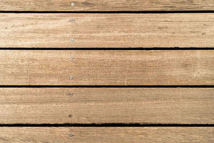 After deck cleaning on bright wood deck boards