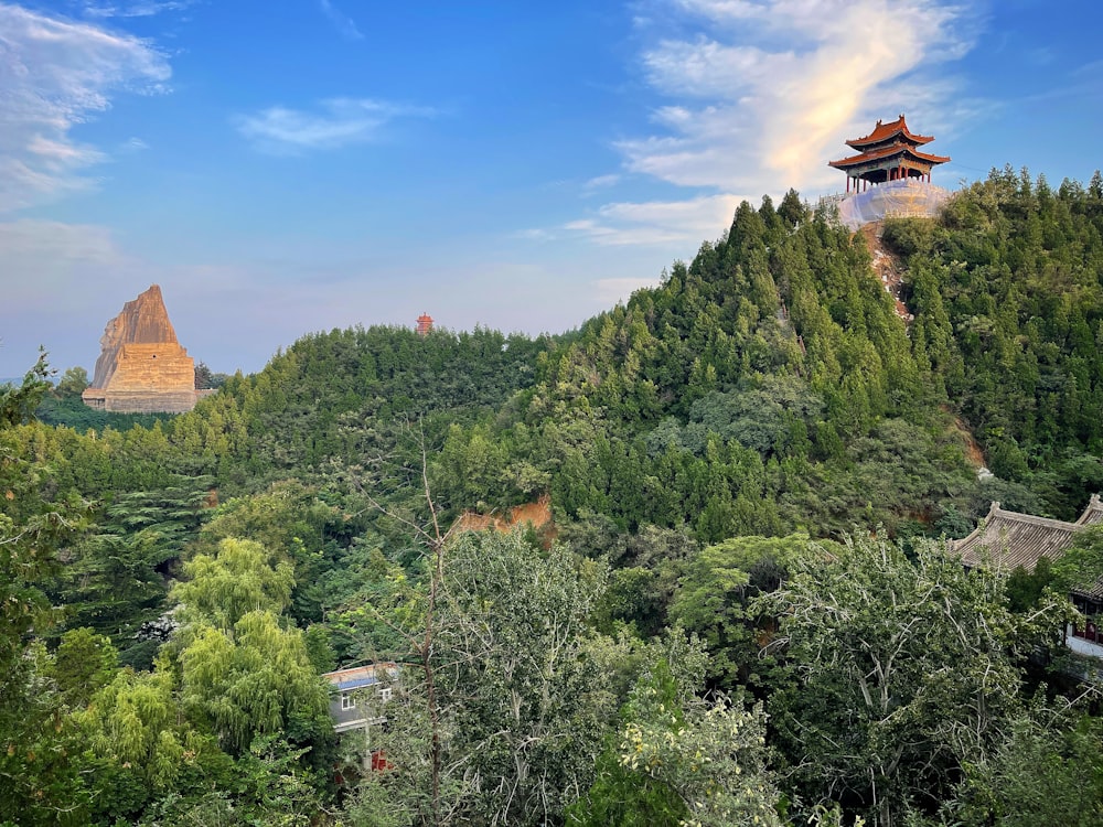 a mountain with a pagoda on top of it