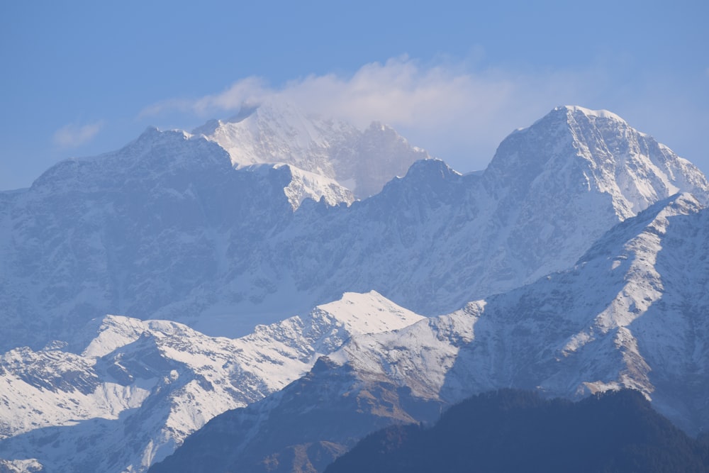 a view of a snow covered mountain range
