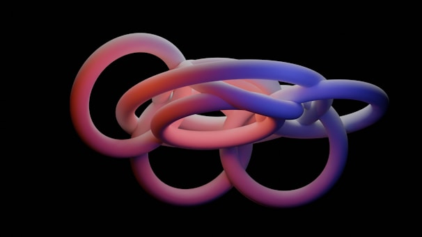 a group of intertwined rings on a black background
