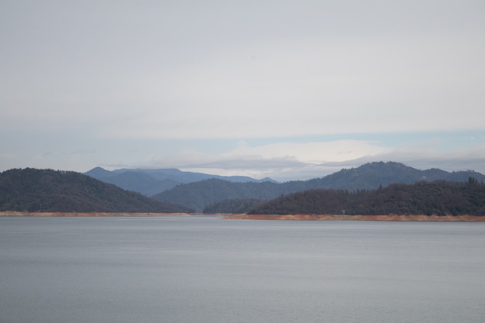 a large body of water surrounded by mountains