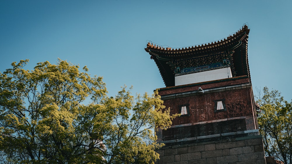 a tall tower with a clock on top of it