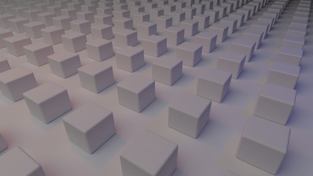 un très grand groupe de cubes blancs dans une pièce