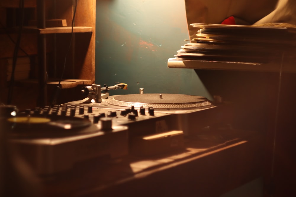 a record player sitting in front of a record player