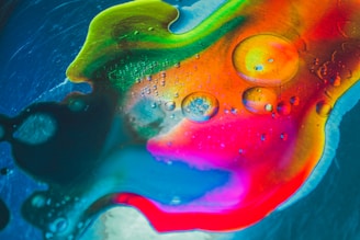 A vibrant resin art piece showcasing swirling colors and glossy finishes.