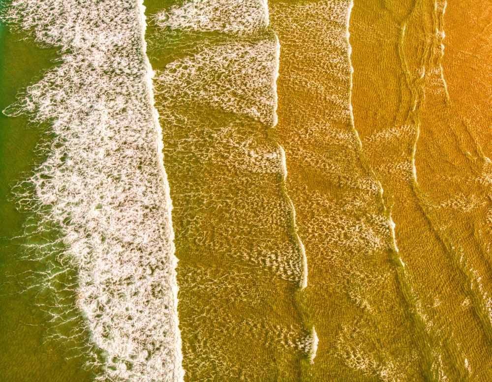 an aerial view of a beach and the ocean