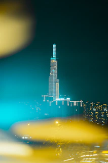 A sleek cinematic video preview card with glowing edges and a subtle electric blue hover effect showcasing a dramatic cityscape at dusk.
