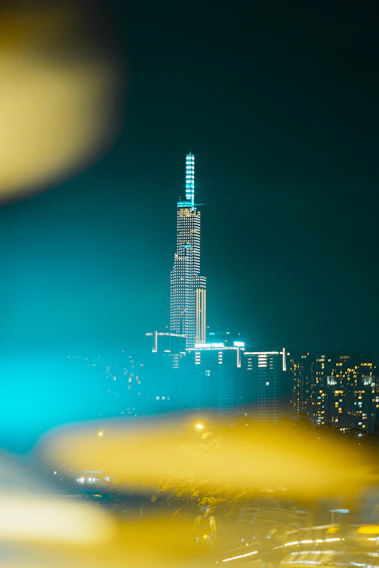 A sleek cinematic video preview card with glowing edges and a subtle electric blue hover effect showcasing a dramatic cityscape at dusk.