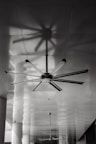 a black and white photo of a ceiling fan