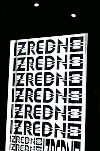 A sleek digital graphic showing the word 'zexki.com' glowing on a modern laptop screen.
