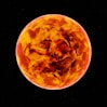 a very bright orange sun with a black background