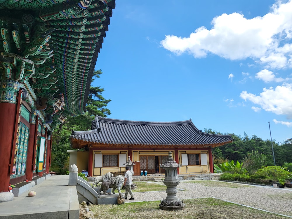 a building with a horse statue in front of it