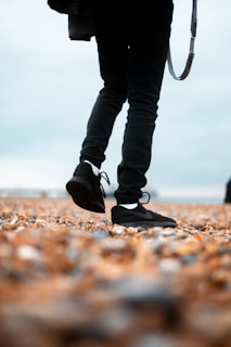 a person with a camera on a leash