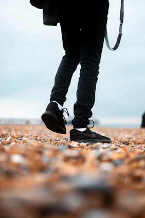 a person with a camera on a leash