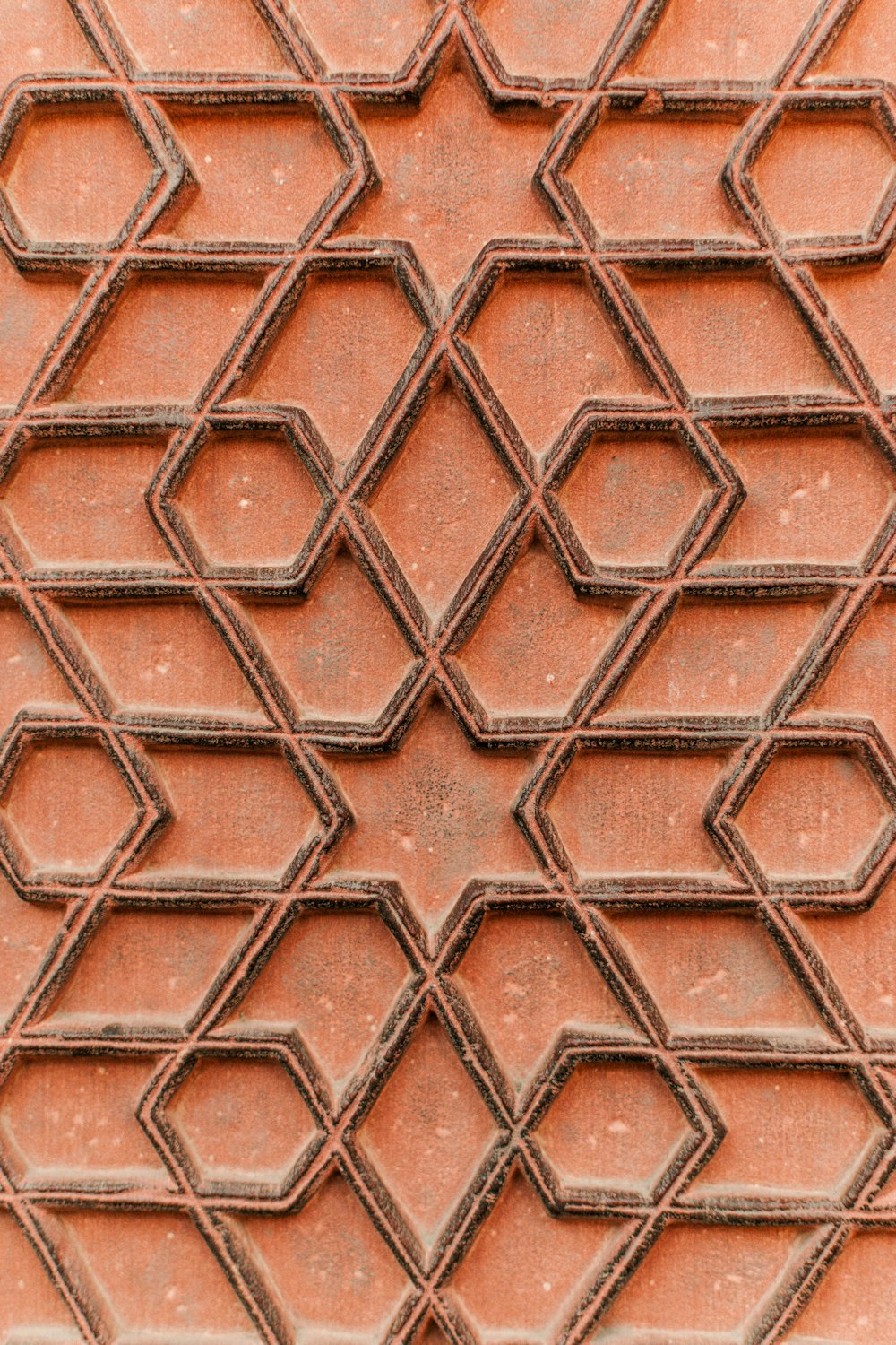 a close up of a wall with a pattern on it