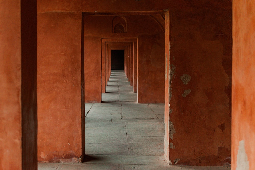 a row of orange walls in a building