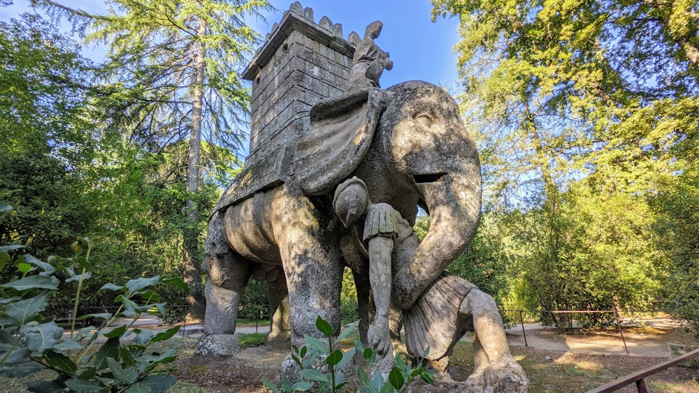 a statue of a man riding an elephant