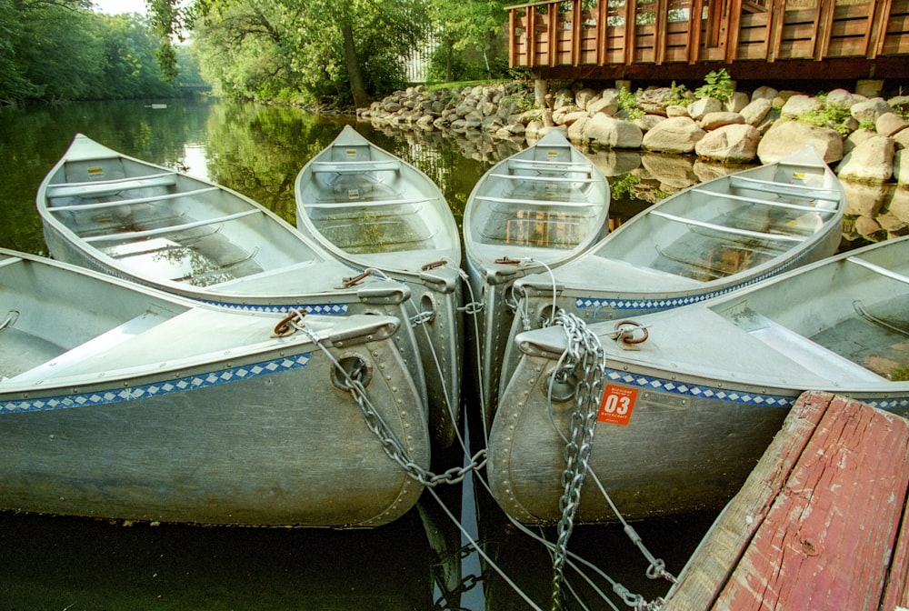 a couple of boats that are sitting in the water