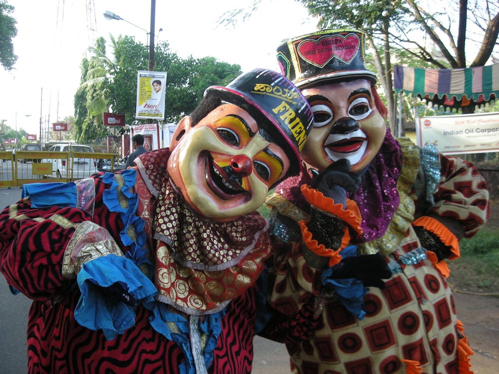 a couple of people that are standing in the street