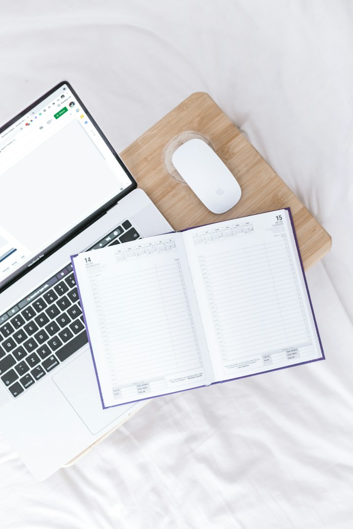 Small business owner working at a tidy office desk