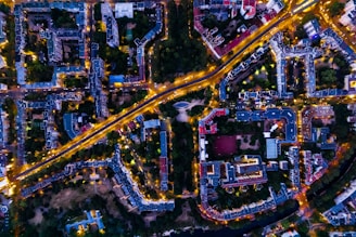 an aerial view of a city at night