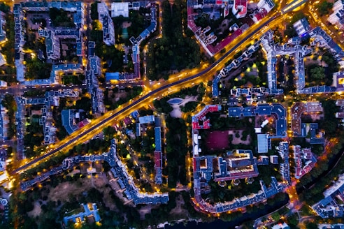 an aerial view of a city at night