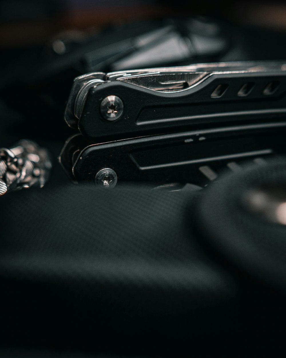 a close up of a black camera with a lens