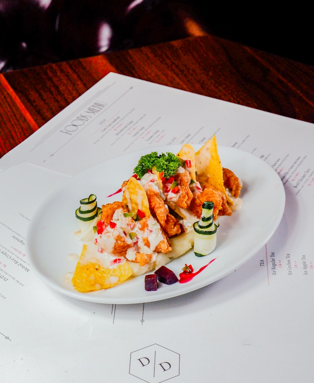 a plate of food sitting on top of a table