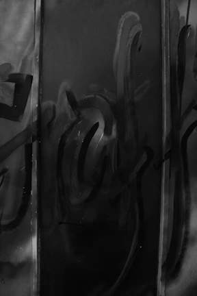 Artistic black and white composition of traditional ink brush strokes.
