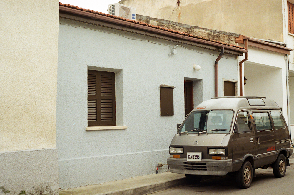 a van parked on the side of a street