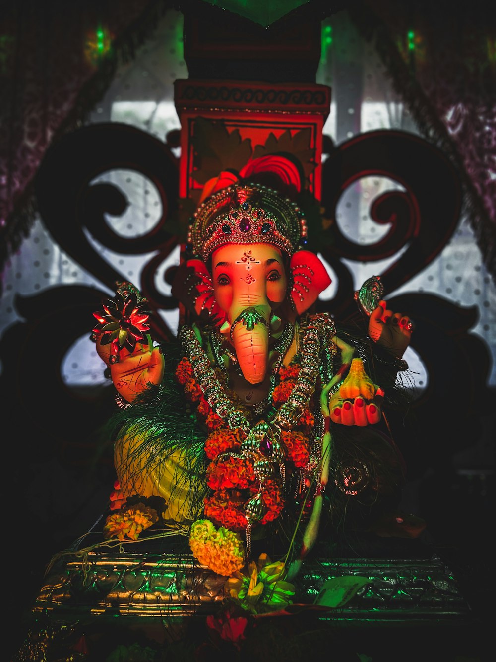 a statue of an elephant is sitting on a table