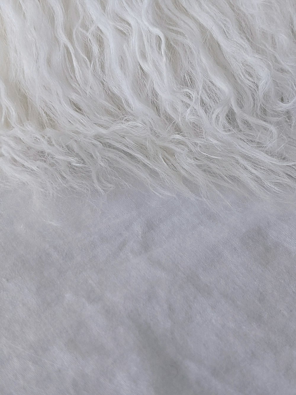 a close up of a white fur texture