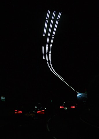 a long line of lights in the dark