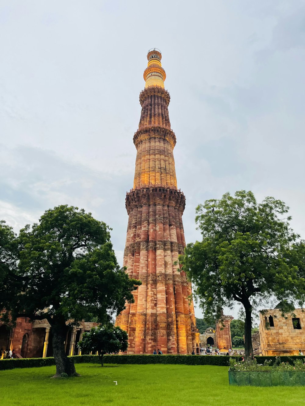 a tall tower with a clock on the top of it