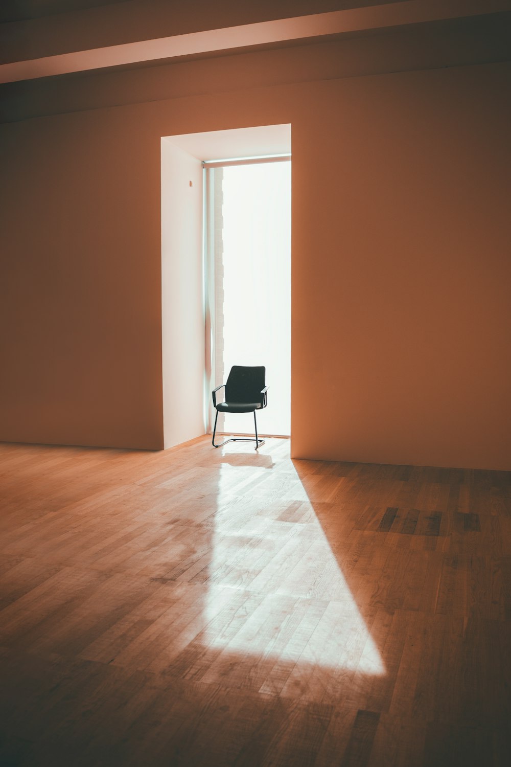 a chair is sitting in the middle of a room