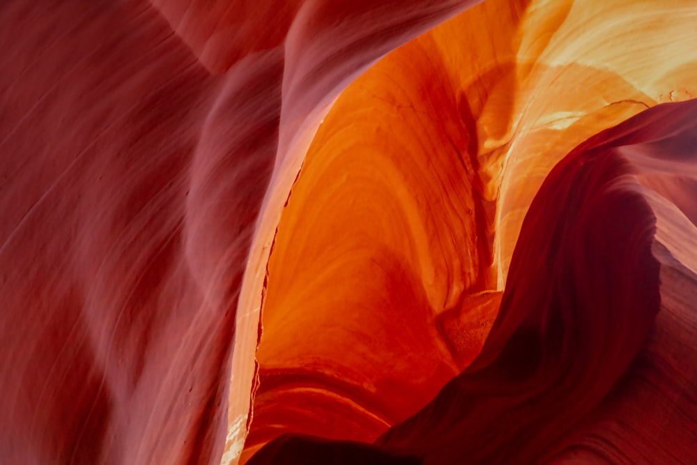 a close up of a rock formation with water