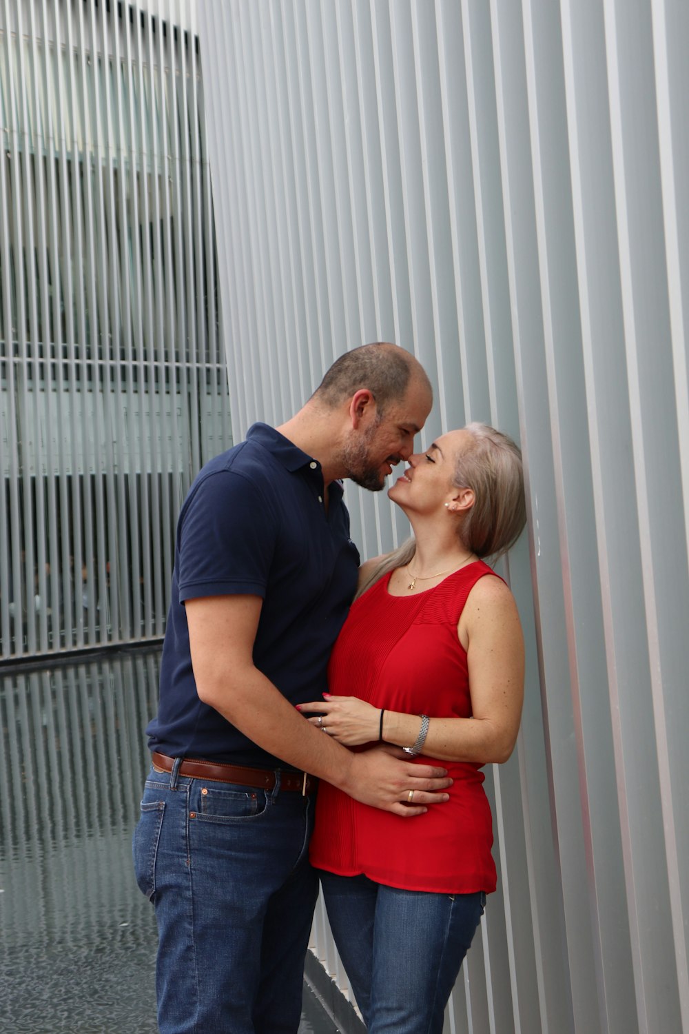 a man and a woman standing next to each other