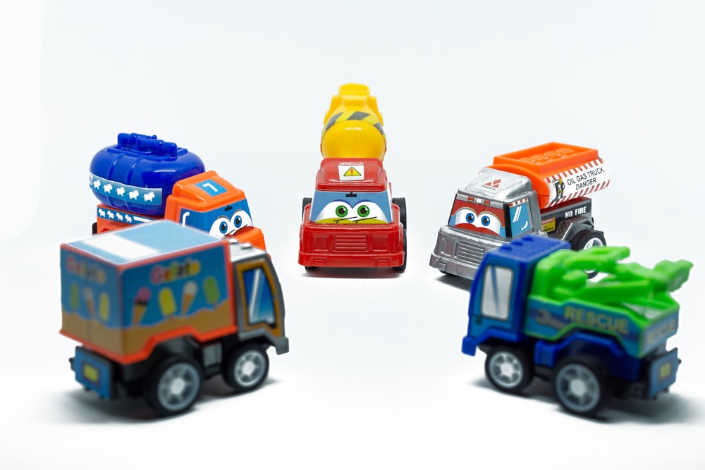 a group of toy cars sitting next to each other