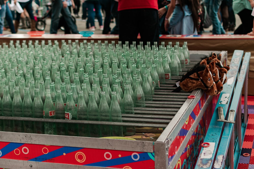 a conveyor belt filled with bottles of water