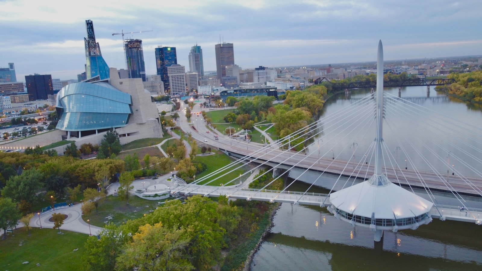 an aerial view of the Provencher bridge and the Canadian Museum for Human Rights in Winnipeg MB